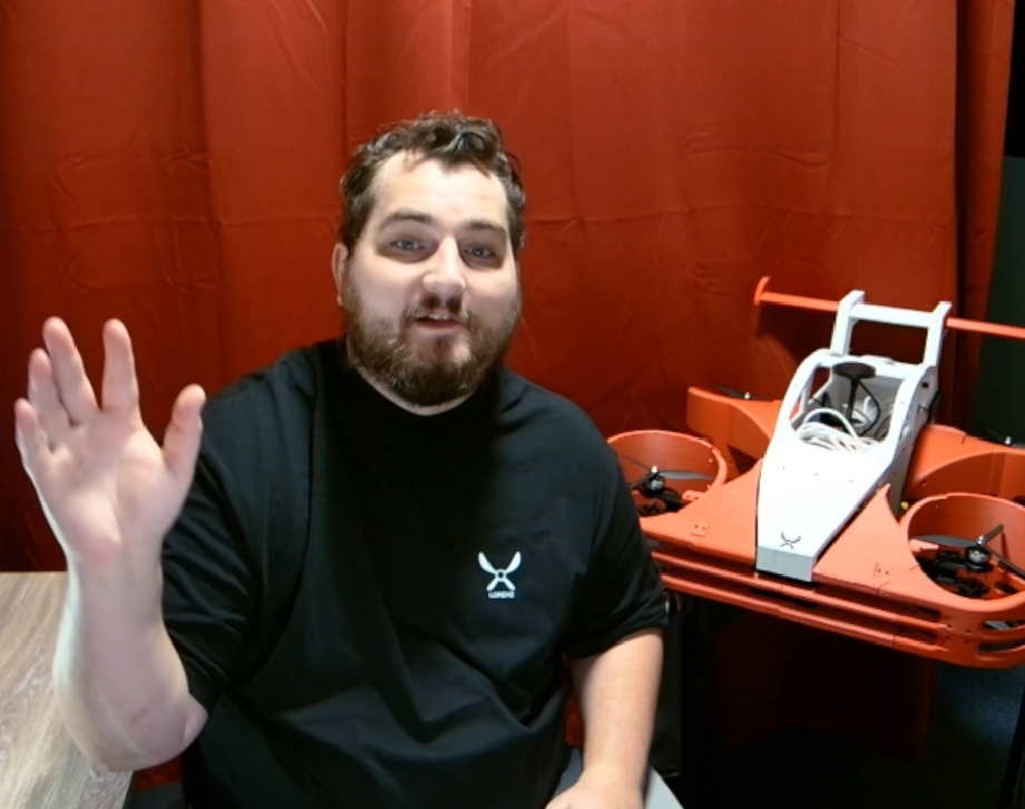 Peter Roman with the Aeroboticar flying car